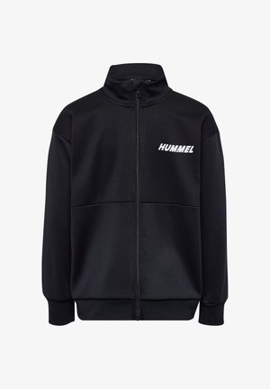Schwarze Jacke mit Reißverschluss, strukturiertem Oberbrustbereich, gerippten Bündchen und weißem "HUMMEL"-Logo auf der linken Brust.