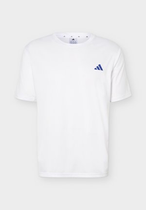 Valge lühikeste varrukatega Adidas T-särk, millel on vasakul rinnal väike sinine Adidas logo ja ümara kaelusega krae.