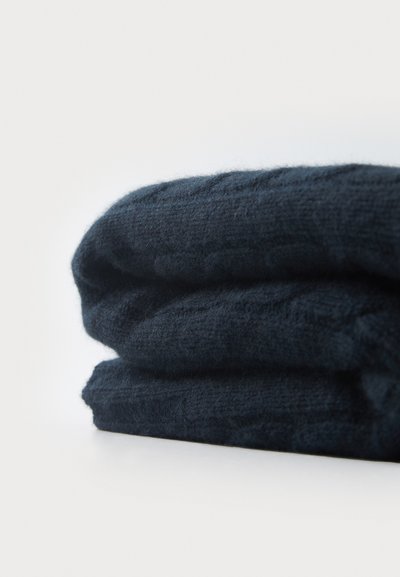 Navy blue scarf made of soft, textured fabric, neatly folded with a slight sheen, showcasing a subtle pattern.