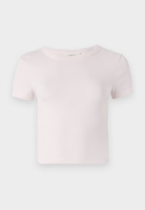 T-shirt à manches courtes en coton rose avec un col rond et une coupe décontractée. Texture lisse et design simple, idéal pour un look décontracté.
