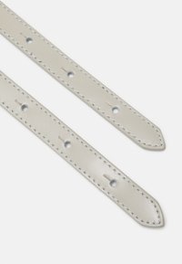 Coccinelle Kabelka - light grey