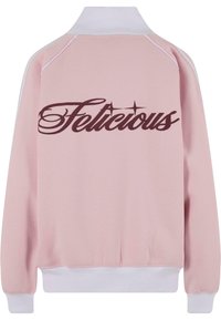Felpa rosa con accenti bianchi e polsini a costine, con la parola "Felicious" in grassetto scuro sulla schiena.