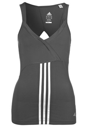 Dark gray sleeveless Adidas sports top with crossed front, white vertical stripes, and branded logos on chest and hem.