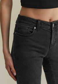 Next Džíny Slim Fit - washed black