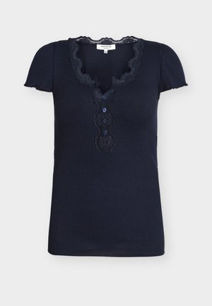 Navy ribbed short-sleeve top with lace trim around V-neck and button placket featuring three small buttons down front.