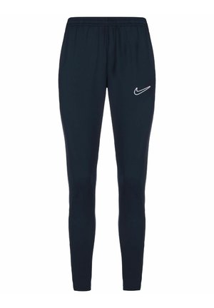 Pantalon de sport noir slim avec taille élastique et logo blanc Nike Swoosh sur la partie supérieure de la cuisse gauche.