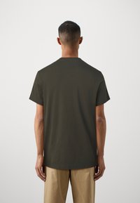 Lacoste Paprasti marškinėliai - dark green