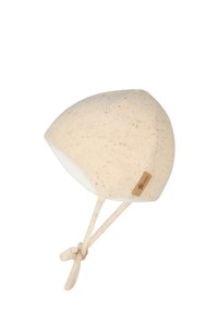 Light beige knit baby hat with a pointed crown, soft lining, and knotted ties. Features a small leather logo tag on the side.