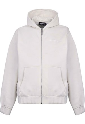 Weiße Zip-Hoodie aus weichem Stoff, mit gefütterter Kapuze, Fronttaschen und gerippten Bündchen sowie gesticktem Logo auf der Brust.