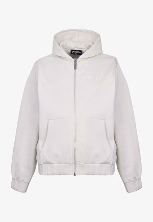 Biała bluza z kapturem na zamek, wykonana z miękkiego materiału, z podszytym kapturem, przednimi kieszeniami oraz wykończonymi ściągaczem mankietami, z haftowanym logo na klatce piersiowej.