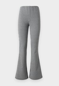 Hoge taille, uitlopende broek in een zwart-wit hondenstoet patroon. Gemaakt van een gestructureerde stof met een elastische tailleband.