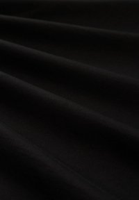 Black fabric with a smooth texture, featuring a matte finish and subtle crease patterns across the surface. Ideal for various applications.
