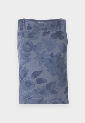 Tumesinist varrukateta tank tops, mis on valmistatud soonikust kangast ja kaunistatud lillemustriga. Sellel on ümar kaelus.