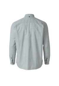 Lichtblauw overhemd met lange mouwen, een gestructureerde stof, knoopmanchetten en een afgeronde kraag. Heeft een kleine zwarte knoop aan de achterkant van de nek.