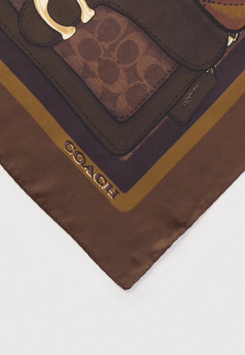 Brown silk scarf featuring a Coach logo, geometric patterns, and a smooth texture. Edges are neatly stitched. Subtle color variations present.
