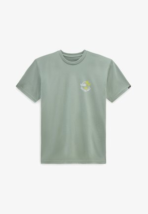 Mint green short-sleeve t-shirt made of soft cotton. Features a white logo design with a palm tree and text on the left chest.