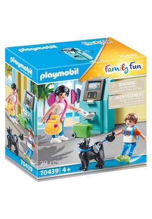 Playmobil set features two figures, a green suitcase, and a black dog. Includes an ATM in a bright turquoise design. 29 pieces total.