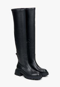 Black leather over-the-knee boots with a chunky sole, smooth texture, side zipper, and reinforced stitching at the top edge.