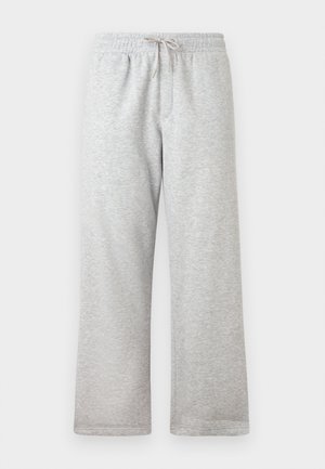 Helle graue Jogginghose mit elastischem Bund und beigem Kordelzug, gerade Passform, vor einem weißen Hintergrund präsentiert.
