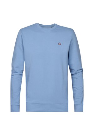 Felpa azzurra chiara, con collo rotondo, maniche lunghe, realizzata in tessuto morbido, presenta un piccolo logo circolare sul petto, polsini e orlo a costine.