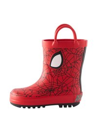 Botte de pluie en caoutchouc rouge avec motif de toile d'araignée noire, design d'œil blanc et semelle texturée. Comprend deux poignées en haut pour un enfilage facile.