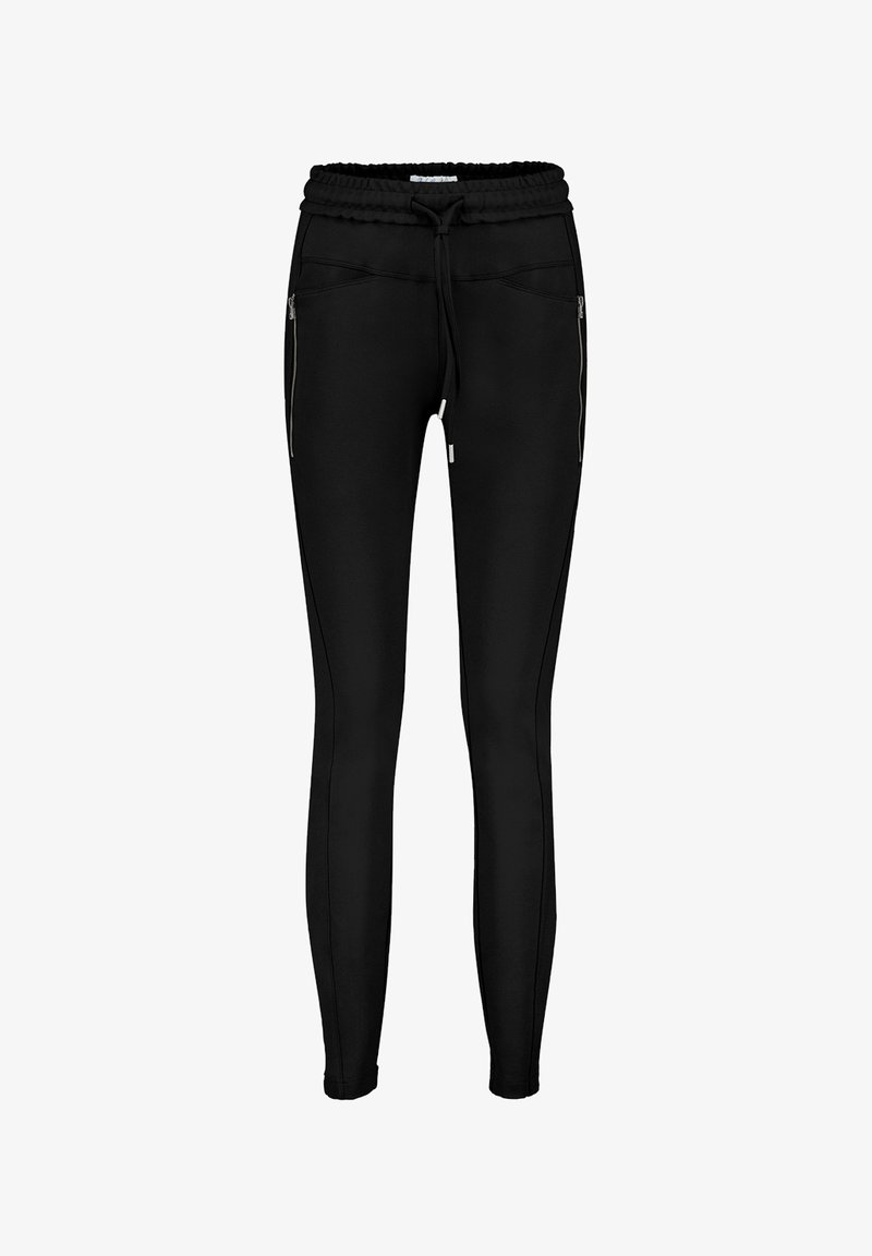 Sorte tapered joggers med elastisk talje og snøre, der har to lynlåslommer foran og kontrasterende sidesømmer. Strækstof.