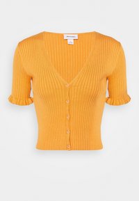 Pomarańczowy kardigan z prążkowanej tkaniny, z krótkimi falbankami na rękawach, dekoltem w serek oraz sześcioma guzikami z przodu. Wykonany z miękkiego, teksturowanego materiału dzianinowego.