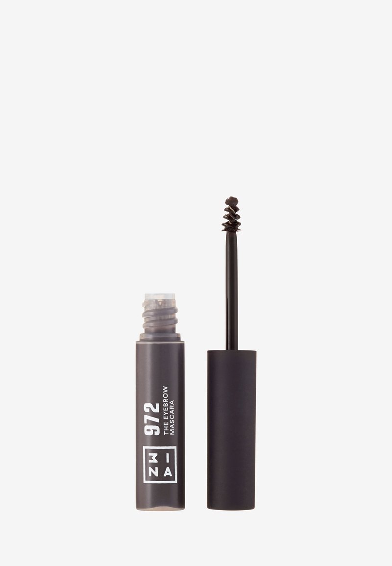 Mascara pour sourcils dans un tube noir mat élégant. Doté d'un applicateur en spirale. Les détails clés incluent le nom et le numéro du produit imprimés en blanc.