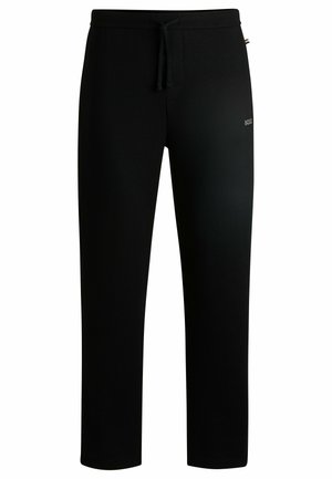 Sorte joggebukser laget av et mykt, strukturert stoff. Har elastisk midje med snøring og en liten logodetalj på venstre side.