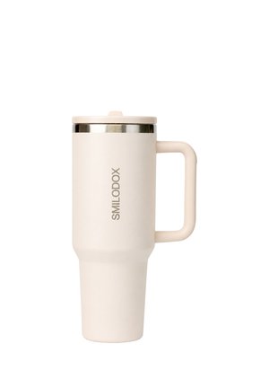 Rejsekrus i cremefarve med håndtag, låg og "SMILODOX" branding på siden.