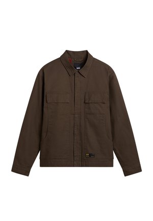 Brown long-sleeve jacket with collar, two chest flap pockets, front zipper cover, and Vans brand label near hem.