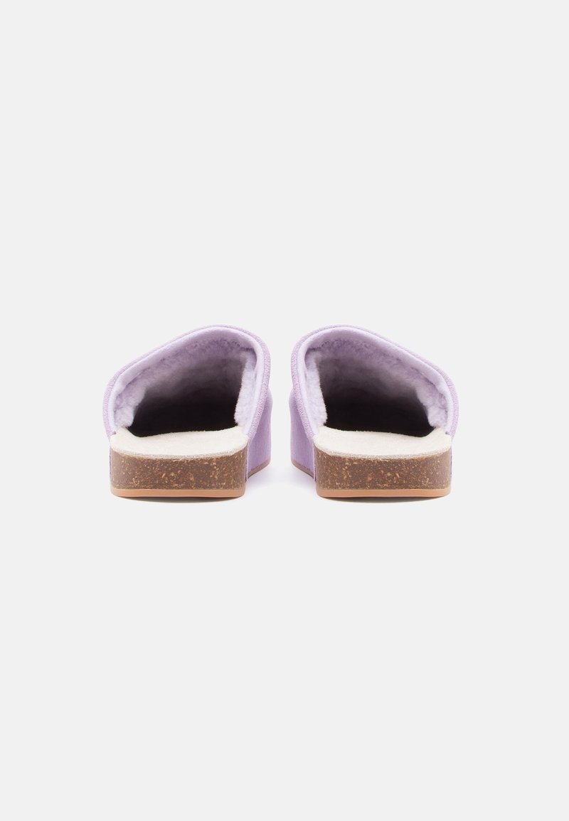 Purple slip-on slippers with a soft interior lining, low cork wedge sole, and curved edges for comfort and ease of wear.