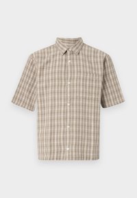 Camicia a maniche corte a quadri in beige e bianco, con colletto, bottoni e taschino sul petto. Realizzata in un tessuto testurizzato.