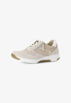 Beige casual sneaker with white sole, side zipper, lace-up front, and perforated detailing on toe and mesh upper panels.