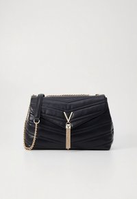 Black leather handbag with chevron quilted design, chain strap, and silver-tone hardware featuring a prominent V and tassel accent.