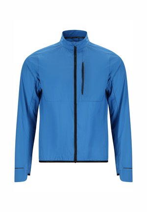 Veste légère bleue avec col montant, fermeture éclair frontale noire et fermeture éclair verticale sur la poche poitrine.