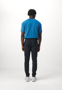 Champion ICON ELASTIC CUFF PANTS - Tepláky - navy