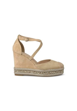 Beige suede wedge sandal with a strap around the ankle, almond-shaped toe, and decorative woven accent on the platform edge.