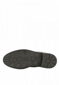 Suola di scarpa in gomma nera con un motivo di battistrada testurizzato caratterizzato da forme angolari e accenti circolari, progettata per offrire trazione e durata.