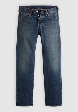 Klassiske jeans med rette bein laget av blå denim, med fem lommer, knappestolpe og subtil falming, med kobbernitter og søm-detaljer.