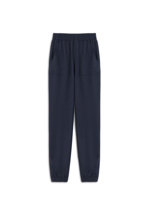 Pantalons de jogging bleu marine en tissu doux, dotés d'une taille élastique, de deux poches avant et d'ouvertures de jambes fuselées avec des poignets élastiques.