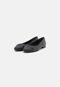 Black leather ballet flats with rounded toes, featuring a shiny buckle accent and a low-profile heel, smooth texture, and streamlined design.