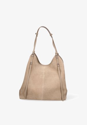 Beige suede shoulder bag with two slim adjustable straps and a curved top opening, standing upright on a white background.