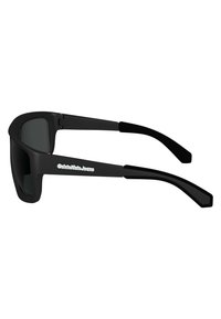 Black plastic sunglasses with a wraparound design, dark lenses, and slim temples. Features a logo along the side.