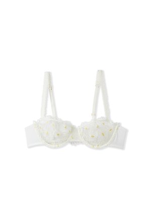 White bra with lace cups featuring floral embroidery and yellow accents. Adjustable straps and a dotted texture on the band.