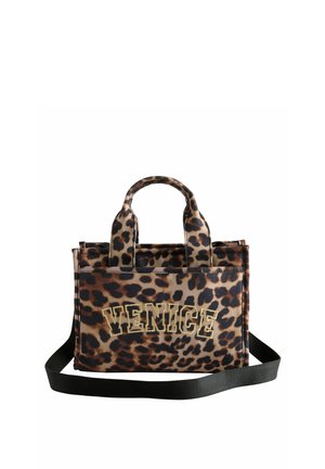 Leopard print handbag with short handles and a detachable black shoulder strap. Features "VENICE" in gold lettering on the front.