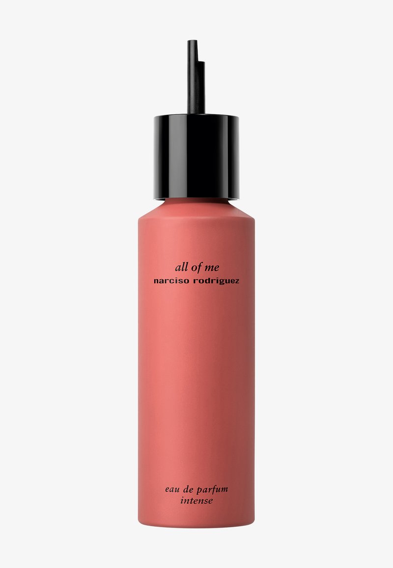 Tall matte coral pink perfume bottle with black pump, labeled "all of me narciso rodriguez" and "eau de parfum intense."
