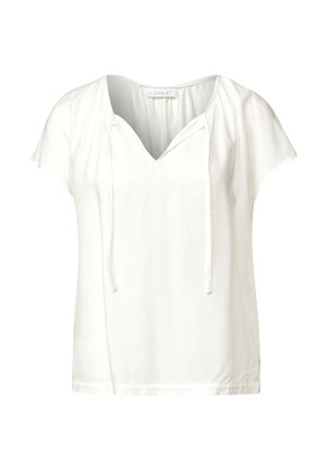 Valkoinen lyhythihainen toppi, jossa on V-pääntie, nyöreillä varustetut yksityiskohdat ja pehmeä, sileä kangas rentoa istuvuutta varten.