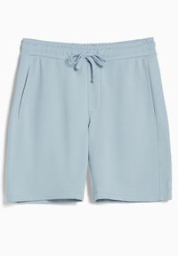 Světle modré volné kraťasy s elastickým pasem, přední šňůrkou, bočními kapsami a malým logem blízko lemu.
