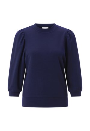 Top de color azul marino con cuello redondeado, mangas largas abullonadas y dobladillo ajustado. Textura de tela suave sin patrones visibles.